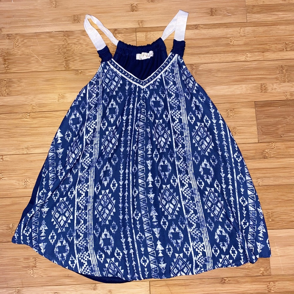 Blue spaghetti strap blouse.